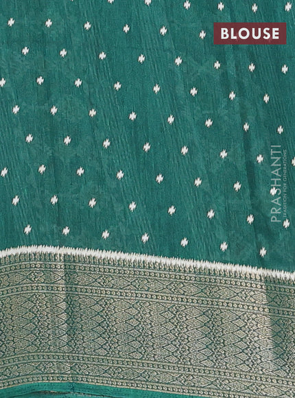 Semi dola saree green with allover ikat prints and zari woven border