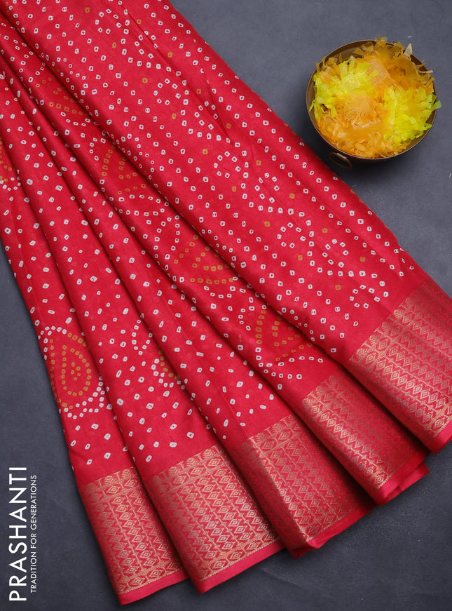 Semi dola saree pink with allover bandhani prints and zari woven border