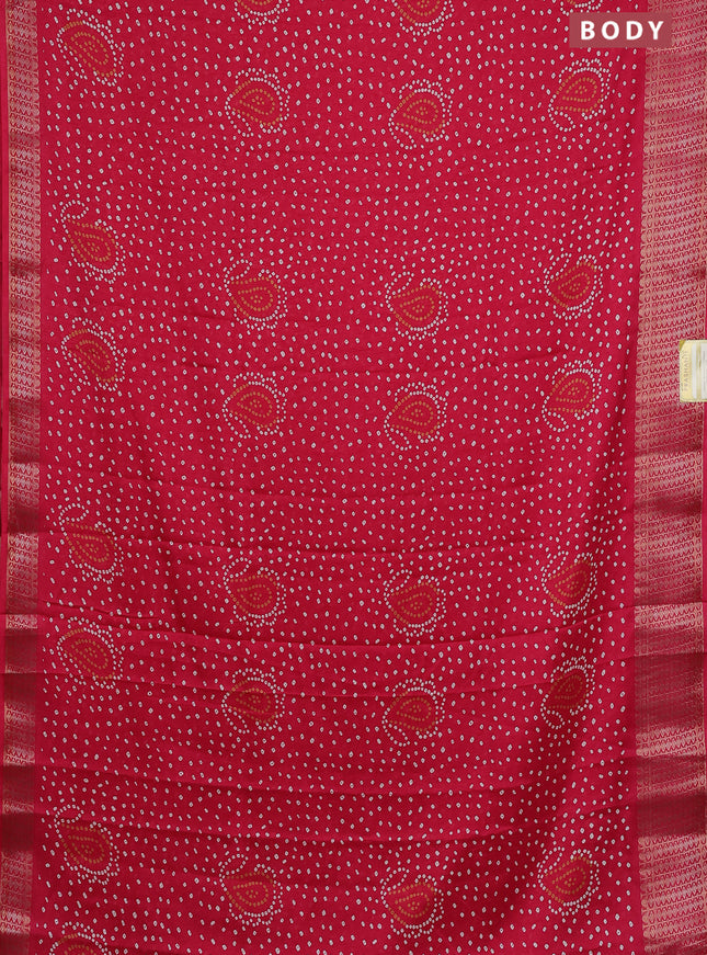 Semi dola saree pink with allover bandhani prints and zari woven border