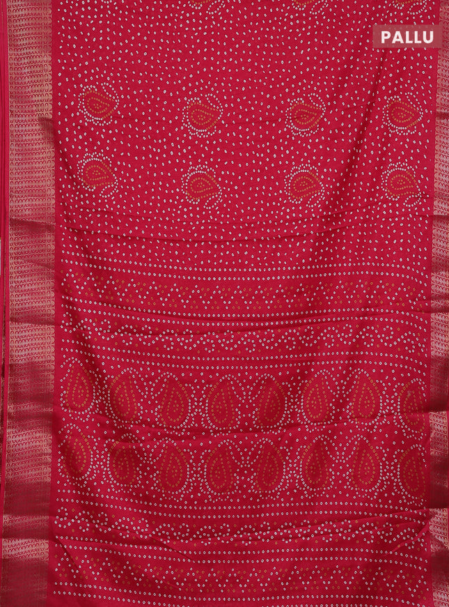 Semi dola saree pink with allover bandhani prints and zari woven border