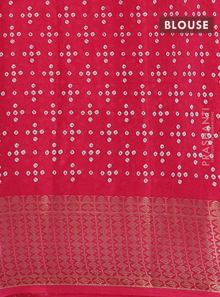 Semi dola saree pink with allover bandhani prints and zari woven border