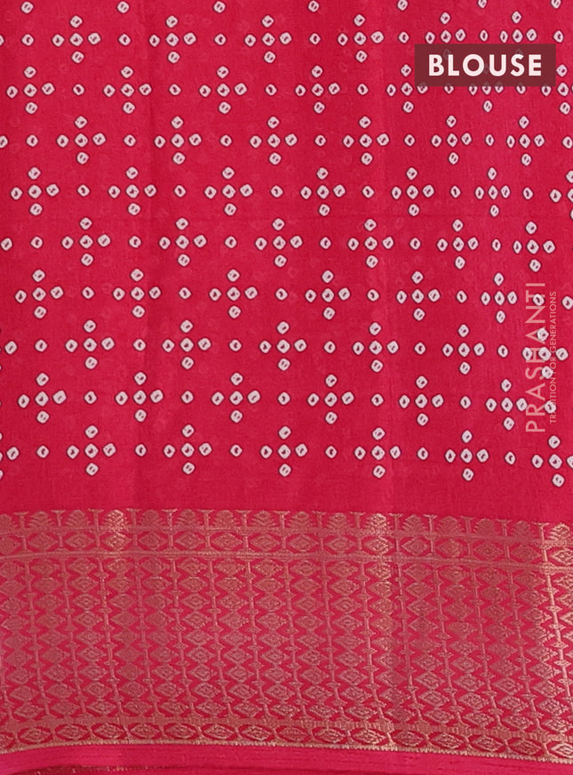Semi dola saree pink with allover bandhani prints and zari woven border