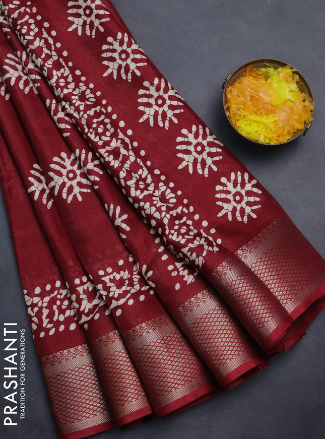 Semi dola saree maroon with butta prints and zari woven border