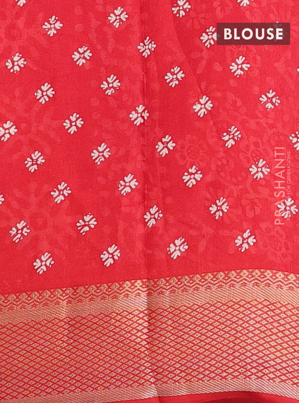 Semi dola saree red with butta prints and zari woven border