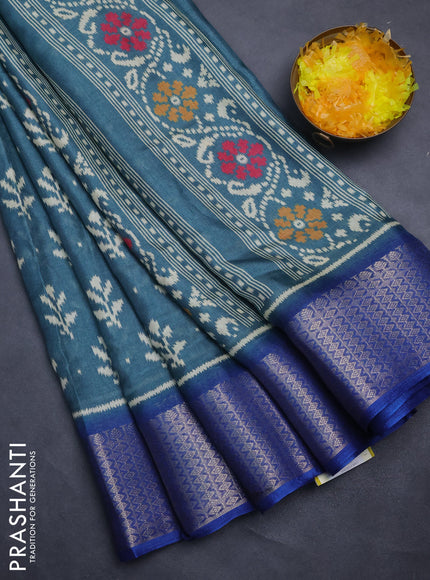 Semi dola saree teal blue and blue with allover ikat butta prints and zari woven border