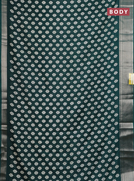 Semi dola saree dark green with allover butta prints and zari woven border