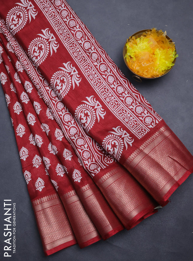 Semi dola saree maroon with allover butta prints and zari woven border