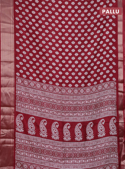Semi dola saree maroon with allover butta prints and zari woven border