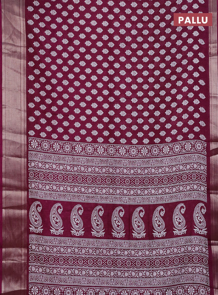 Semi dola saree wine shade with allover butta prints and zari woven border