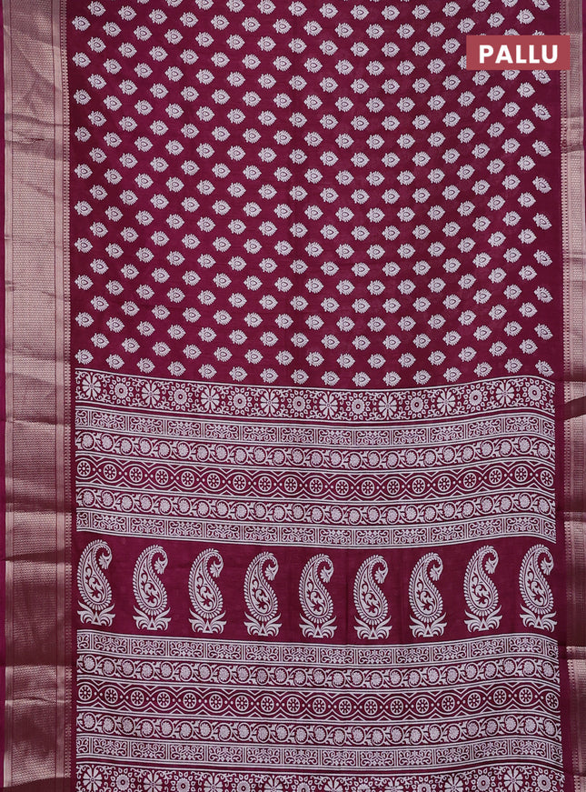 Semi dola saree wine shade with allover butta prints and zari woven border
