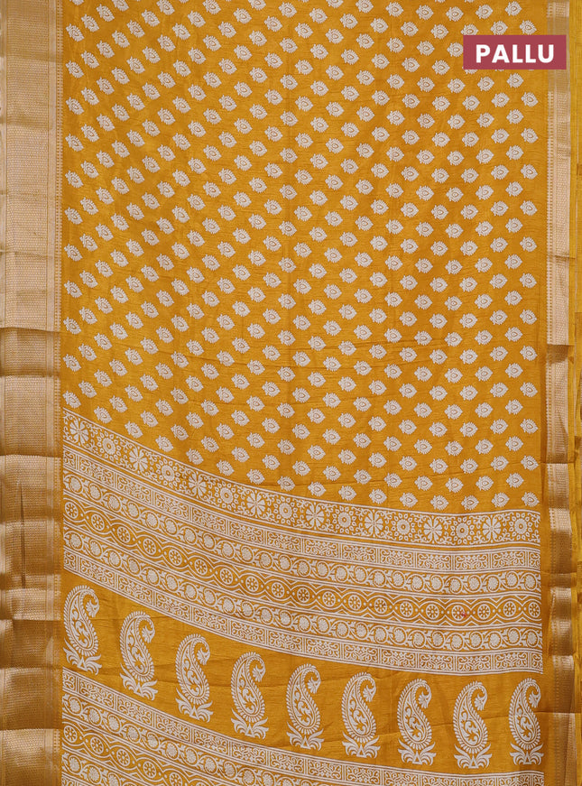 Semi dola saree mustard yellow with allover butta prints and zari woven border