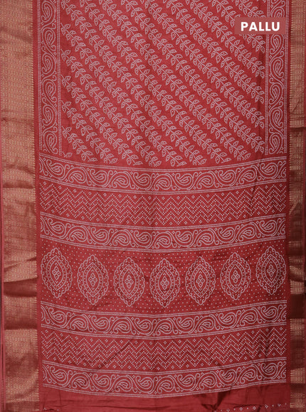 Semi dola saree maroon with allover bandhani prints and zari woven border