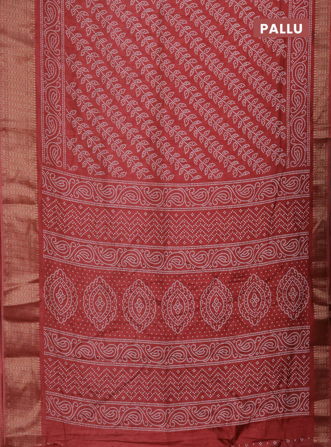 Semi dola saree maroon with allover bandhani prints and zari woven border
