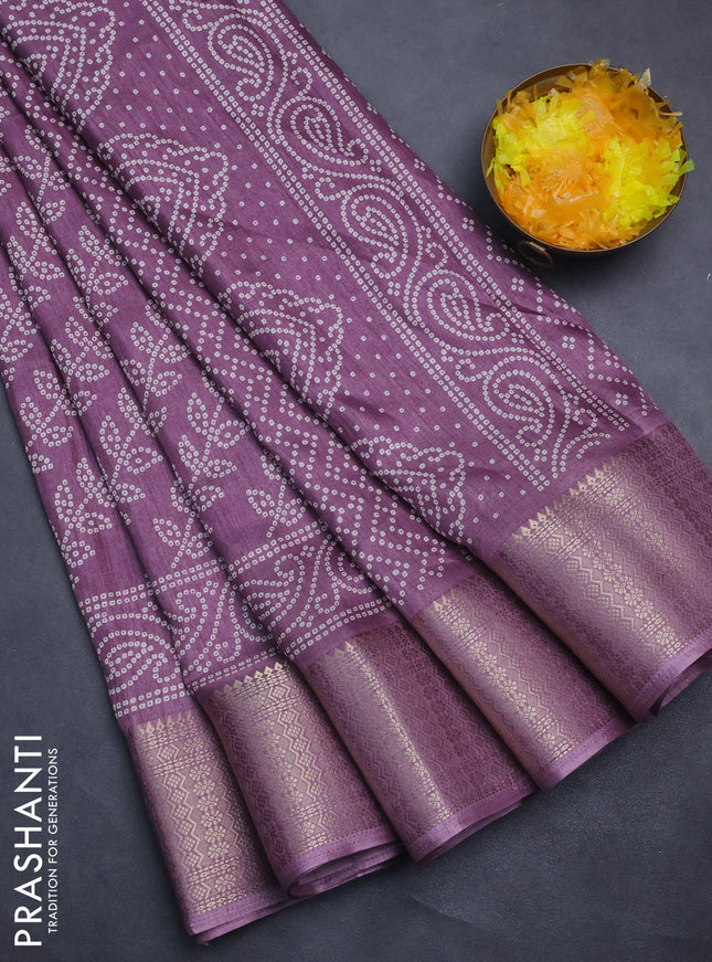Semi dola saree mild purple with allover bandhani prints and zari woven border