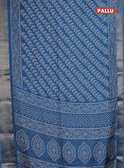 Semi dola saree peacock blue with allover bandhani prints and zari woven border