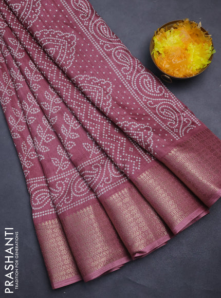 Semi dola saree mauve pink with allover bandhani prints and zari woven border