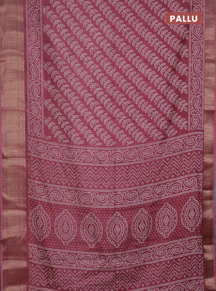 Semi dola saree mauve pink with allover bandhani prints and zari woven border