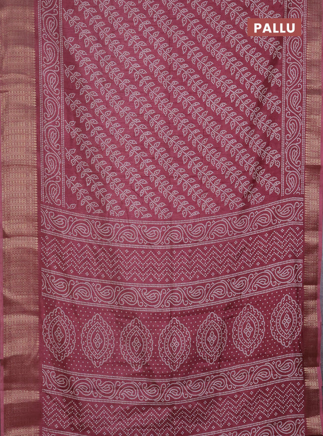Semi dola saree mauve pink with allover bandhani prints and zari woven border