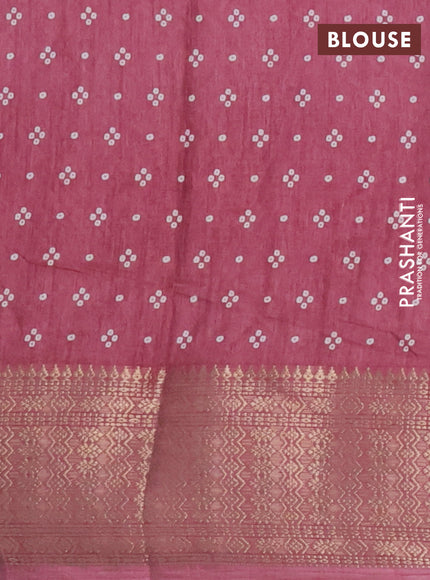 Semi dola saree mauve pink with allover bandhani prints and zari woven border