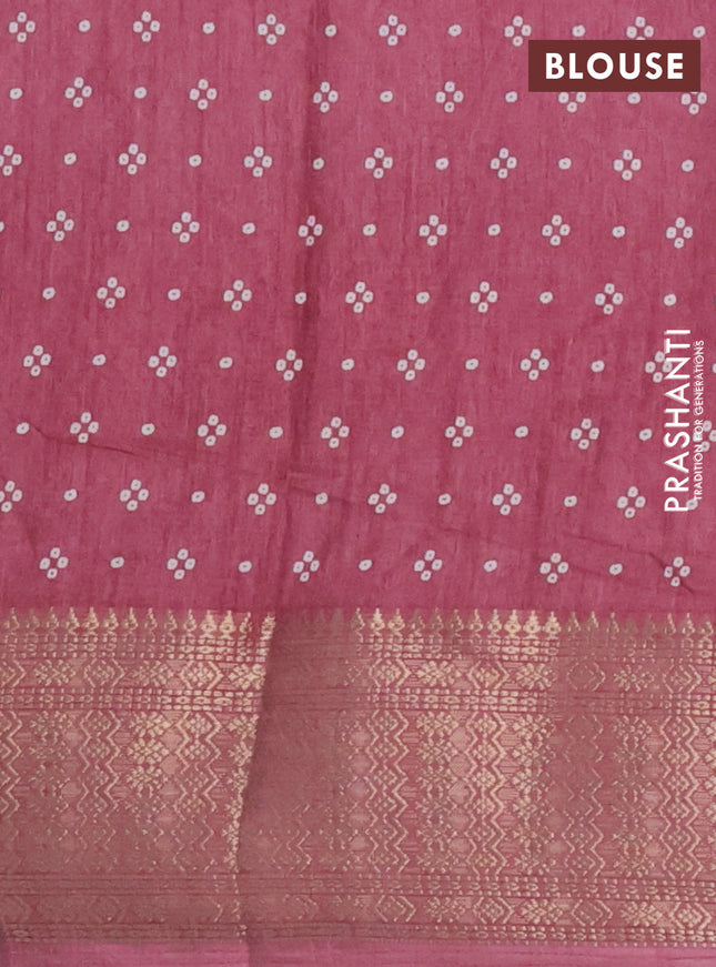 Semi dola saree mauve pink with allover bandhani prints and zari woven border