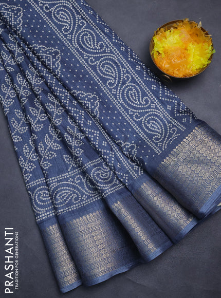 Semi dola saree bluish grey with allover bandhani prints and zari woven border