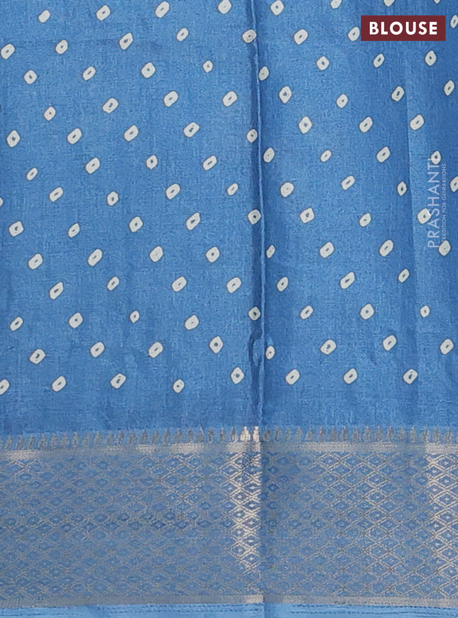 Semi dola saree blue shade with butta prints and zari woven border