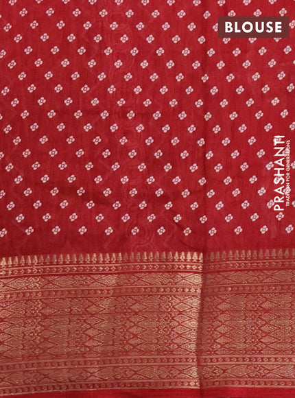 Semi dola saree maroon with allover prints and zari woven border