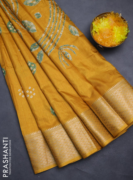 Semi dola saree yellow with butta prints and zari woven border