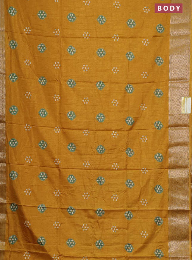 Semi dola saree yellow with butta prints and zari woven border