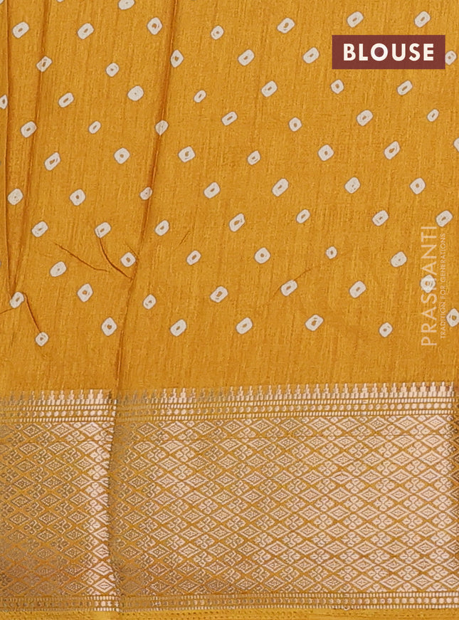Semi dola saree yellow with butta prints and zari woven border