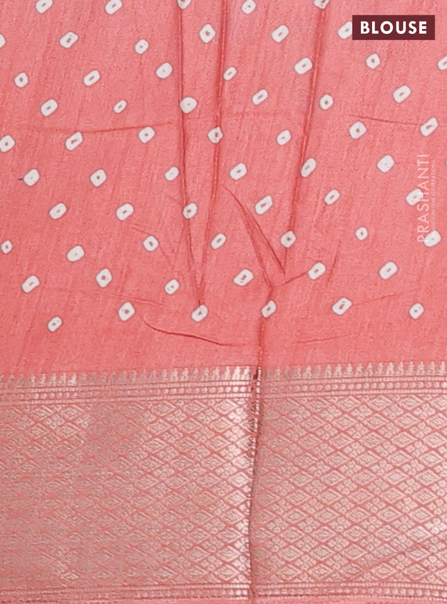 Semi dola saree peach orange with butta prints and zari woven border