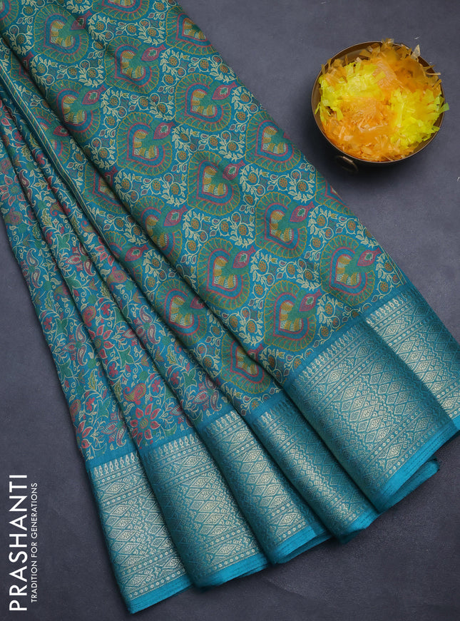 Semi dola saree teal green with allover prints and zari woven border