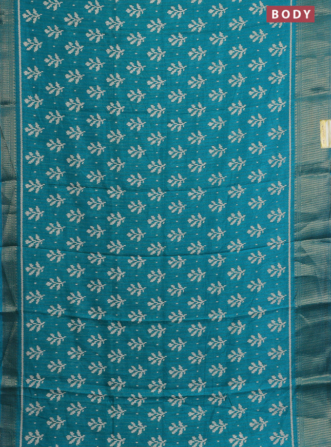 Semi dola saree teal blue with allover ikat butta prints & zari weaves and zari woven border