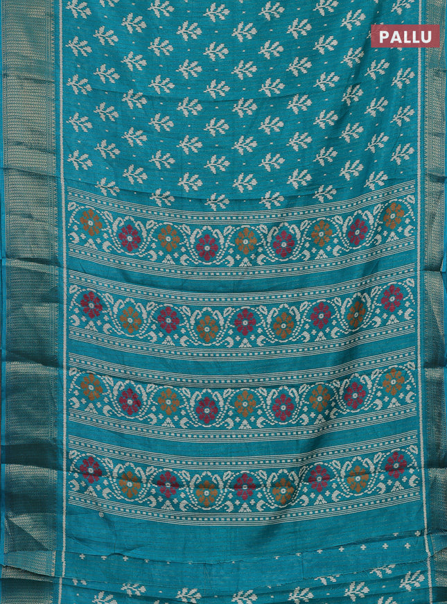 Semi dola saree teal blue with allover ikat butta prints & zari weaves and zari woven border