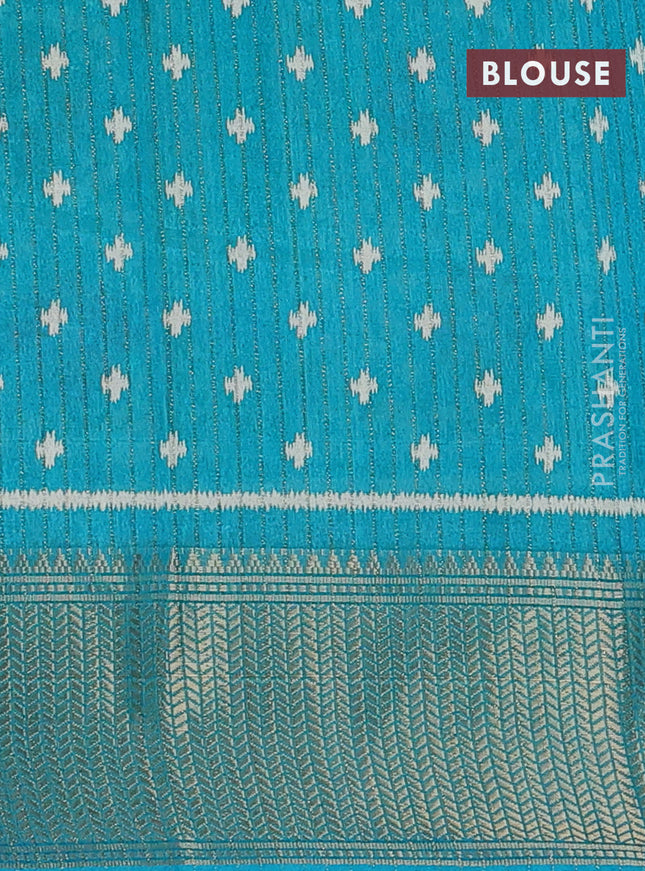 Semi dola saree teal blue with allover ikat butta prints & zari weaves and zari woven border