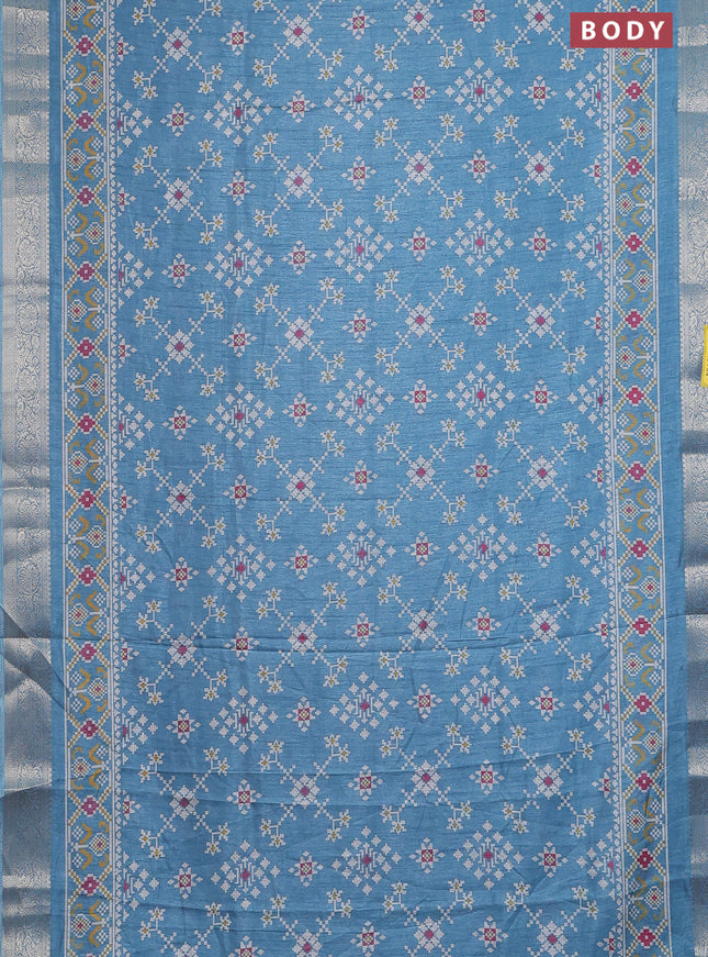 Semi dola saree pastel blue with allover ikat prints and zari woven border