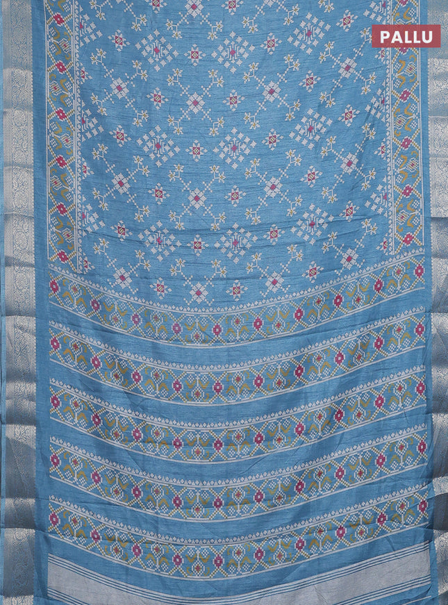 Semi dola saree pastel blue with allover ikat prints and zari woven border
