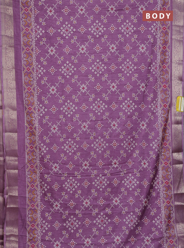 Semi dola saree pastel purple with allover ikat prints and zari woven border