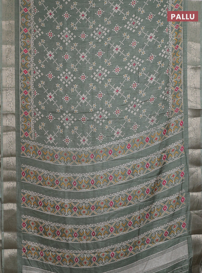 Semi dola saree greyish green with allover ikat prints and zari woven border