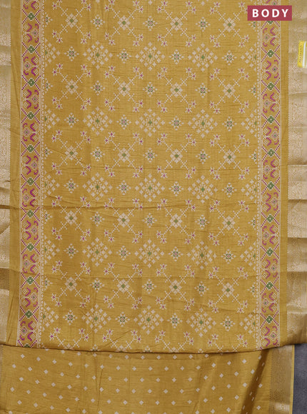 Semi dola saree mustard shade with allover ikat prints and zari woven border