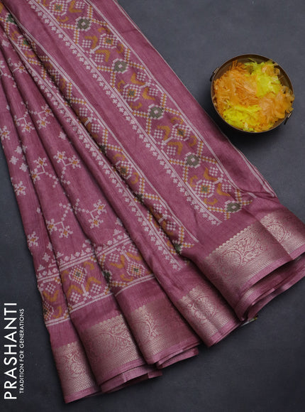 Semi dola saree mauve pink with allover ikat prints and zari woven border