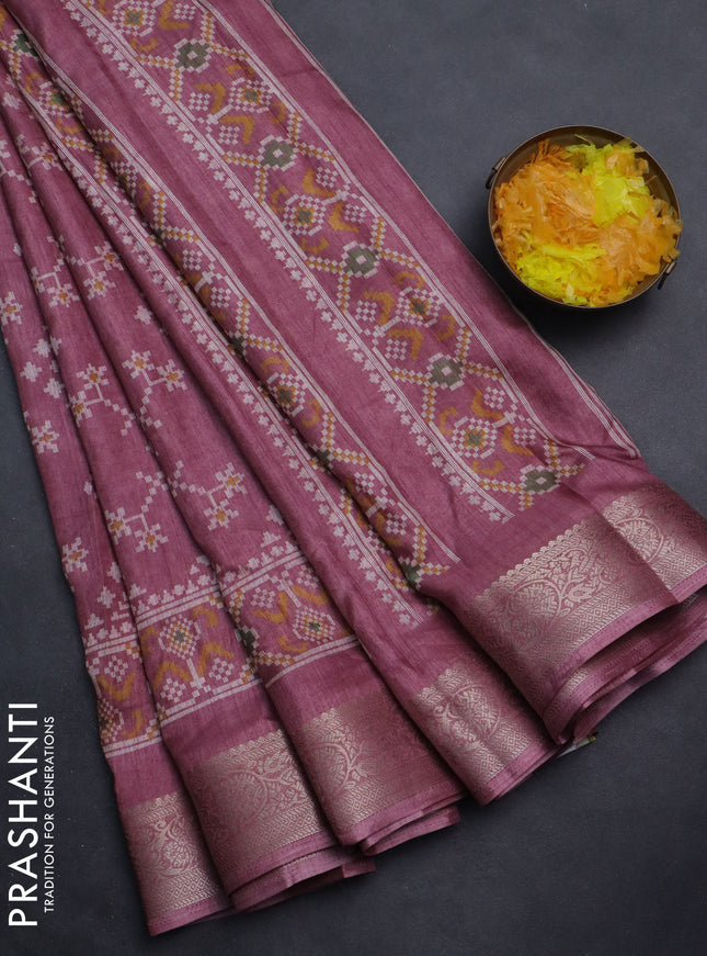 Semi dola saree mauve pink with allover ikat prints and zari woven border