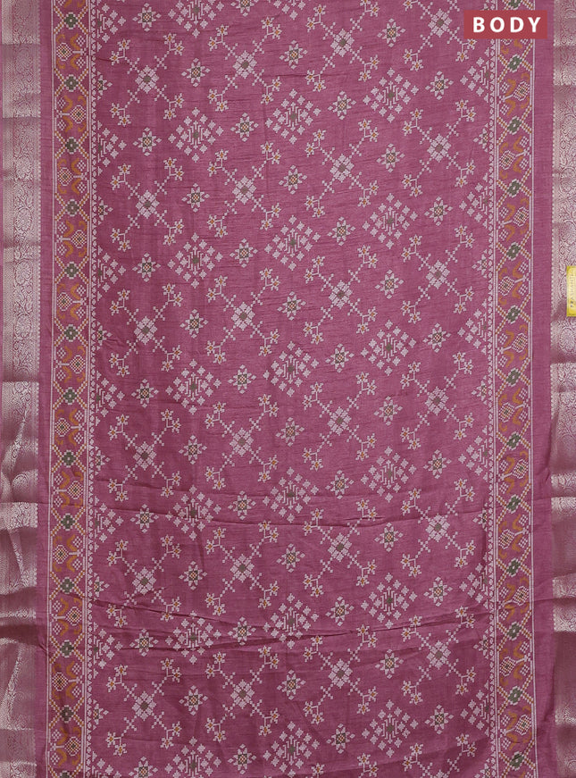 Semi dola saree mauve pink with allover ikat prints and zari woven border