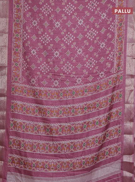 Semi dola saree mauve pink with allover ikat prints and zari woven border