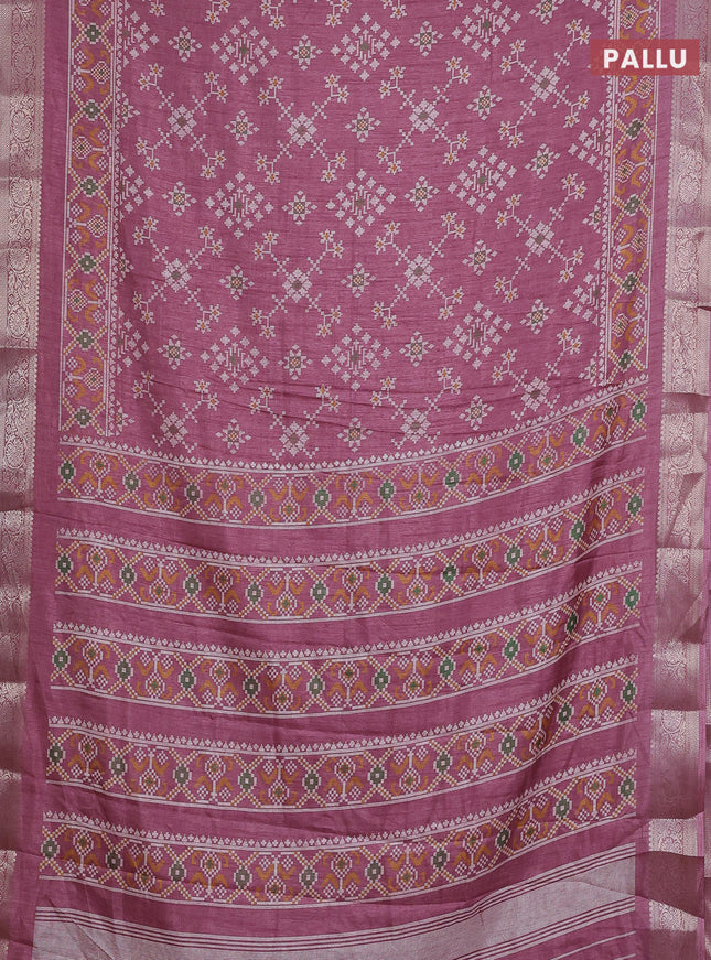 Semi dola saree mauve pink with allover ikat prints and zari woven border