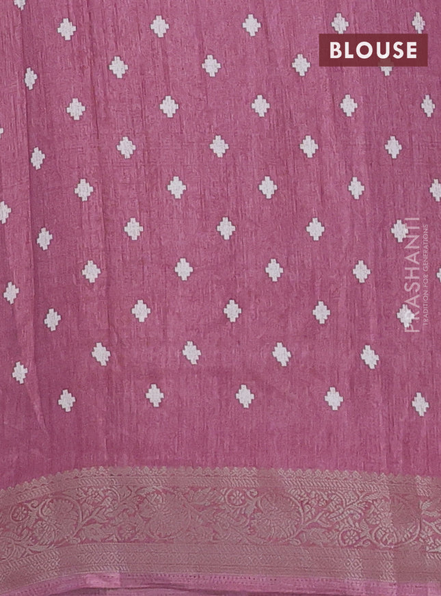Semi dola saree mauve pink with allover ikat prints and zari woven border