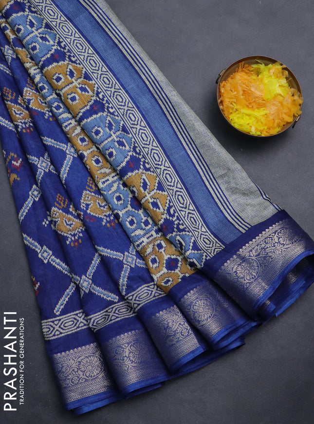 Semi dola saree dark blue with allover patola prints and zari woven border