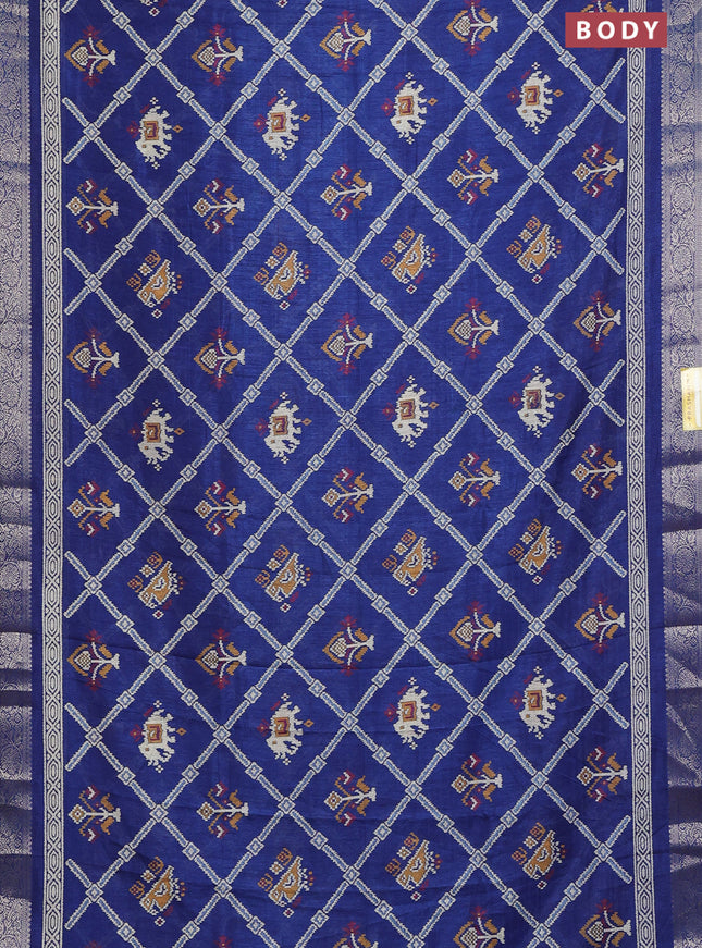 Semi dola saree dark blue with allover patola prints and zari woven border