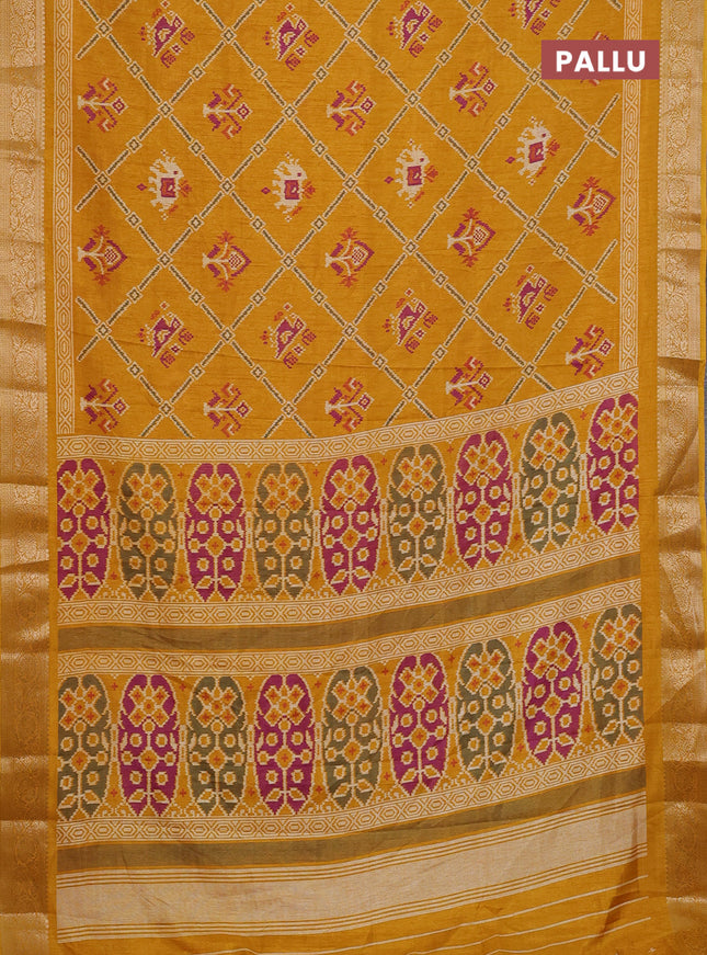 Semi dola saree mustard yellow with allover patola prints and zari woven border