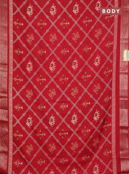 Semi dola saree red with allover patola prints and zari woven border
